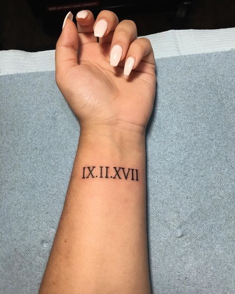 These Roman numeral tattoo ideas are all the inspiration you need to get inked. Take a look at the most sophisticated options now! Roman Numeral Tattoo Arm, Roman Numeral Wrist Tattoo, Roman Numeral Date Tattoo, Inner Wrist Tattoos, Happy Songs, Roman Tattoo, Roman Numeral Tattoo, Numeral Tattoo, Tattoo Appointment