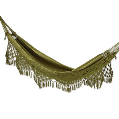 After a long day full of stress, nothing is better than comfortably resting on a soft surface in the open air, listening to the peaceful chant of the birds. The Hammock Artisans of Ceara, from Brazil, make this ethereal scenario possible by creating a single hammock with cotton in a charming olive tone and adding crocheted accents at each side, all made in a traditional loom called mamucaba Hamicks In Bedrooms, Hammock In Bedroom, Fairy Room, Rope Hammock, Olive Tone, Indoor Hammock, Outdoor Bedroom, Camping Hammock, Hammock Stand