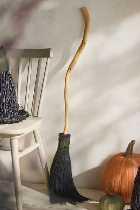 This handcrafted witch's broomstick isn't just a Halloween decoration, it can actually be used to sweep dusty floors with. Unfortunately, it doesn't fly though. Handmade Broom, Cast Iron Decor, Witches Broomsticks, Bat Wall, Outdoor Living Furniture, Organic Decor, Living Essentials, Witch Broom, Glass Pumpkins