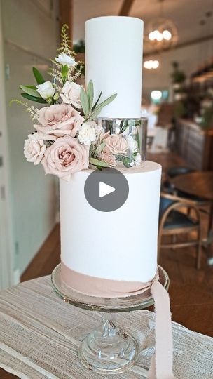 NO ROOM FOR ERROR... 

A sleek, modern white wedding cake leaves no room for error. 

This stunning signature design cake was created for C&E's beautiful wedding at @cidermillbarns on Friday. 

The loveliest flowers from @wild.stems 
Acrylic tier from @prop.options 

#whitewedding #weddingcakeinspo #cotswoldweddingcakes #weddingflowers #fondantcakes | Perfect Cakes Co | mylessmithuk · Betting on Us Wedding Cake With Acrylic Tier, Acrylic Cake Tier, Cake With Acrylic Spacer, Modern White Wedding Cake, Acrylic Separator Wedding Cake, Tier Cake With Acrylic Spacer, Ukrasavanje Torti, 1 Tier Cake, Modern White Wedding