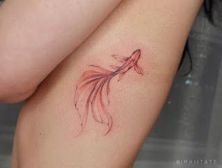 30+ Eye Catching Red Tattoos Ideas And Their Meanings Woman Koi Fish Tattoo, Koi Red Tattoo, Red Coy Fish Tattoo, Red Koi Fish Tattoo For Women, Koi Fish Leg Tattoo Women, Koi Fish Tattoo Small Simple, Black And Red Koi Fish Tattoo, Betta Fish Tattoo Design, Red And Black Tattoo Women