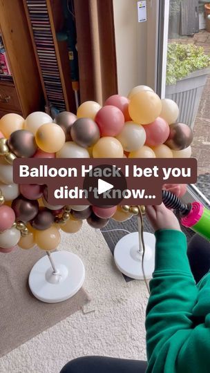 How To Arrange Balloons Party Ideas, Tabletop Balloon Arch, Hanging Balloon Decorations, How To Hang Balloons Without Helium, Balloon Arrangement Ideas, How To Tie A Balloon With A Hanger, Tying Balloons Hack, How To Make A Balloon Wall, How To Make Balloons Last Longer