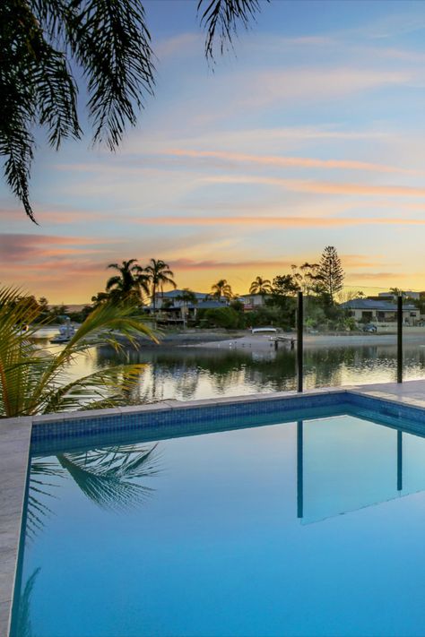 tranquil pool with canal view at sunset Gold Coast Mansion, Gold Coast House, Gold Coast Aesthetic, Brisbane House, Australia Life, Future Motivation, Australia House, 5 Year Plan, Digital Vision Board