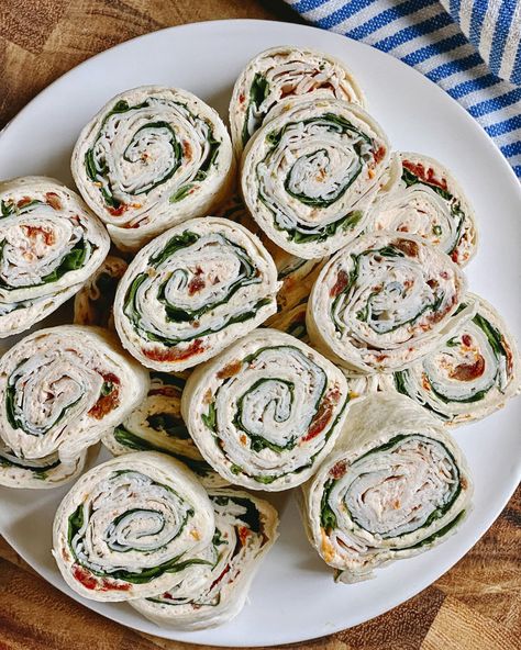 Turkey Pinwheels Recipe (Mediterranean-Inspired) | Kitchn High Protein Pin Wheels, Turkey Wrap Pinwheels, Turkey And Spinach Pinwheels, Turkey Pinwheels Recipes, Turkey Red Pepper Pinwheels, Healthy Pin Wheels, Turkey Pinwheels Appetizers, Pinwheel Recipes High Protein, Mediterranean Roll Ups