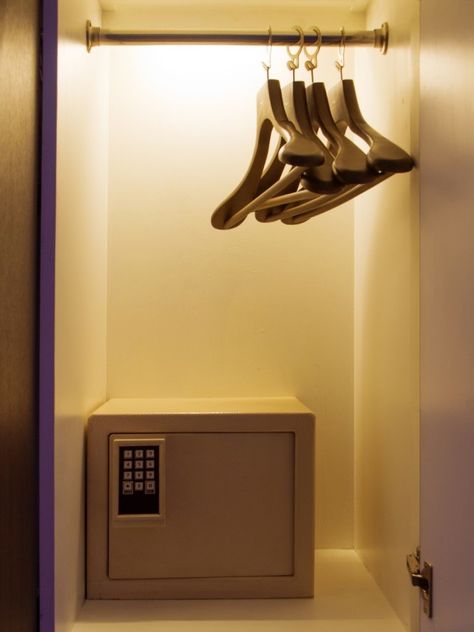 12 Smart Places to Hide a Safe  ||  Keep the whereabouts of your valuables on lock with these secret storage ideas https://www.bobvila.com/slideshow/12-smart-places-to-hide-a-safe-53100?slide_name=12-hidden-safes-that-can-thwart-burglars& Closet Safe Ideas, Secret Storage Ideas, Storage Ideas For Bedrooms, Closet Safe, Safe Lockers, Secret Drawer, Small Safe, Secret Hiding Places, Hidden Safe