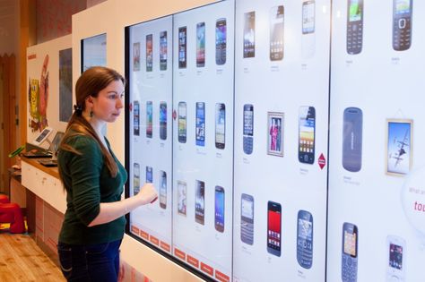 Interactive Touch Screen Mobile Wall Phone Kiosk, Interactive Retail, Interactive Touch Screen, Digital Retail, Store Experience, Retail Technology, Interactive Walls, Interactive Installation, Video Wall