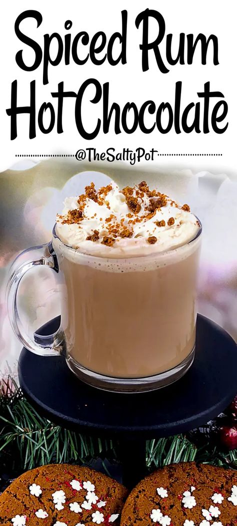 Warm up those chilly nights with a comforting cup of our Spiced Rum Hot Chocolate. Delicately infused with traditional spices like cinnamon, nutmeg, and cloves. Add it's final hint of spiced rum by adding it to the cup so that this rich and creamy hot cocoa can cater to all – children, non-drinkers, and those looking for a spirited kick. Hot Chocolate Rum Chata, Hot Chocolate With Rum, Spiked Hot Cocoa Recipes, Recipes With Spiced Rum, Hot Rum Drinks, Chocolate Rum Drinks, Boozy Hot Chocolate Recipe, Winter Rum Drinks, Winter Rum Cocktails