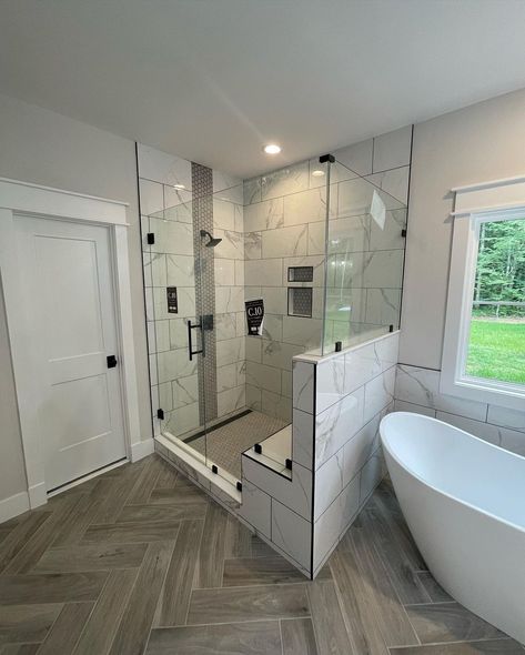 Wood Tile And Marble Bathroom, Pony Wall Between Shower And Tub, Shower Seats Ideas Benches, Separate Tub And Shower Ideas, Bathroom With Wood Tile Floor, Small Shower Ideas, Wood Like Tile Flooring, Bathtub Tile Surround, Soaking Tub Shower Combo