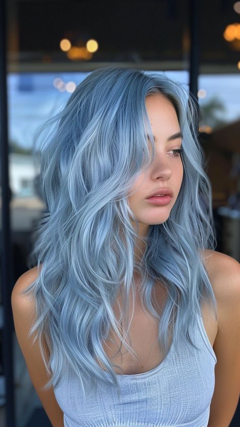 26 Blue Hair Color Ideas to Set Trends Frosted Blue Hair, Silver To Blue Ombre Hair, Silver Hair Blue Highlights, Blue Grey Hair Color Silver, Teal Blue Hair Color, Steel Blue Hair Color, Dusty Blue Hair Color, Silver Hair With Blue Highlights, Light Blue Money Piece Hair