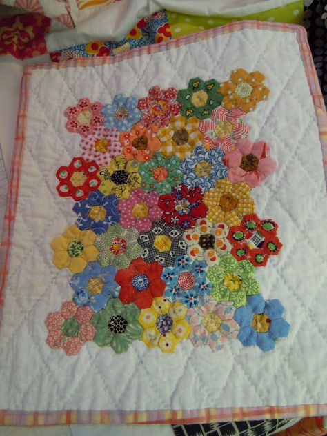 This is a blog for the busy woman who quilts, sews, cooks, decorates, and loves to craft! Grandma's Garden Quilt Pattern, Grandmothers Garden Epp, Hexagon Flower Quilt Patterns, Grandmothers Flower Garden Quilt Pattern Free, Grandma’s Flower Garden Quilt Pattern, Grandmas Flower Garden Quilts, Hexie Quilts Patterns Layout, Grandmothers Flower Garden Quilt Pattern, Hex Quilt