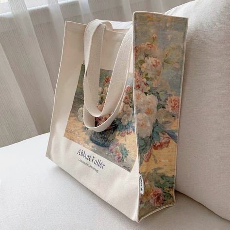 A tote bag depicting "Still Life of Flowers" by Abbott Fuller Graves. Pink and white roses are overflowing from the vase, creating a romantic atmosphere. It is made of thick canvas material and has plenty of storage capacity. Comes with a pocket inside. Pack your computer and your favorite books and head out.       Size     Height: 36cm   Width: 36cm   gusset: 10cm       Material     Thick canvas fabric Elegant Tote Bag, Cute Tote Bag Ideas, Tote Bag Ideas Design, Gift Bag Design, Tote Bag Design Ideas, Creative Tote Bag, Flower Bags, Elegant Purse, Pink And White Roses