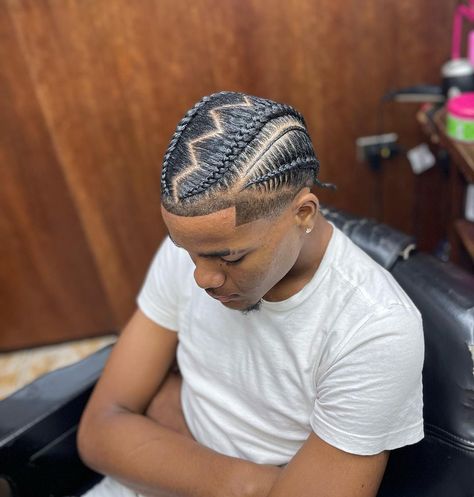 17 Male Braids Hairstyles For A Unique And Trendy Look Feed In Braids Men, Freestyle Stitch Braids Men, Braided Hairstyles For Men Cornrows, Men Feed In Braids, Men Braid Styles For Short Hair, 4 Braids Hairstyle Men, Male Stitch Braids Hairstyles, Mens 4 Braids Hairstyles, Braids Hairstyle Men