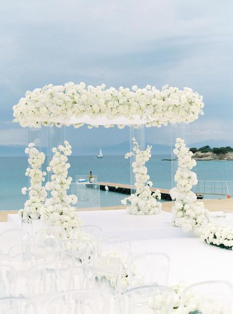 Glam Beach Wedding Ceremony, Beach Wedding White Flowers, Florida Beach House Wedding, All White Wedding Ceremony Decor, White Flower Chuppah, All White Outdoor Wedding, Nobu Wedding, Expensive Wedding Decor, Beach Wedding Altar