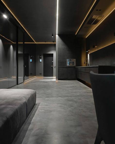 This apartment has a dark color scheme with some reflective panels and lighting. The look is really outstanding in its simplicity. There are some yellow lamps installed there to calm down the solid dark atmosphere around the room. Hi-Tech Design from @allofarchitecture Yellow Lamps, Dark Interior Design, Dark Atmosphere, Interior Studio, Yellow Lamp, Dark Modern, Apartment Decoration, Living Room Design Inspiration, Trend 2024