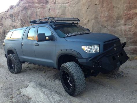 A Toyota Tundra painted with LINE-X, a spray-on protective coating, maneuvers during a photo shoot in the desert. Line X Paint Job, Bedliner Paint Job Truck, Raptor Liner Paint Job, Bed Liner Paint Job, Bedliner Paint Job, Tundra Overland, Tundra Mods, Bed Liner Paint, Truck Paint Jobs