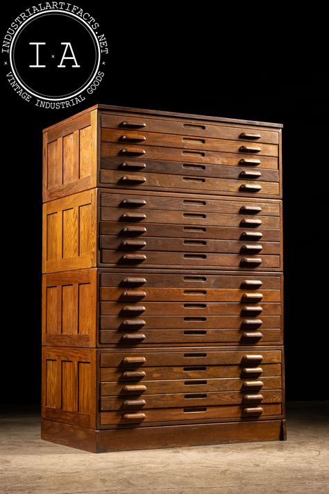 c. 1920s; Hamilton Manufacturing Co. - Two Rivers, WI Traditional 20-drawer flat file cabinet with quarter sawn wood. This piece features wooden drawer pulls and shallow, recessed paneling on either side. Cabinet also comes apart in four sections for ease of transport.  The cabinet exhibits some scratches and wear from years of use. 40.75" W x 28" D x 63" H Drawers (x20): 37.5" W x 25" D x 2" H Please refer to photos regarding condition. This item will need to be shipped via freight. Please review our freight shipment Terms and Conditions below. MM - C-10154 - 072624 TERMS & CONDITIONS PARCEL SHIPPING We ship smaller objects with UPS and USPS. All shipments are fully insured and adhere to carrier packing guidelines. Shipping costs for smaller items are free up to $100. If a parcel shipment Antique Parts Cabinet, Antique Library Card Cabinet, Flat File Cabinet, Antique Wooden Filing Cabinet, Steampunk Cabinet Vintage Industrial, Wooden Drawer Pulls, Retro Filing Cabinet Vintage Industrial, Antique Oak Furniture, Flat File