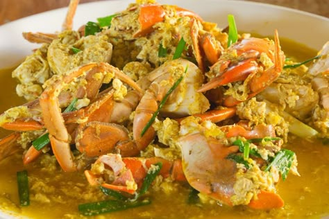 Simple Jamaican Curry Crab Recipe - Jamaicans.com Blue Crab Curry Recipe, Jamaican Crab Recipes, Southern Thai Yellow Crab Curry, Curry Crab Legs Recipe, Curry Crab Jamaican, Coconut Curry Crab, Crab Curry Recipe Coconut Milk, Curry Seafood Recipes, Curry Crab Recipe