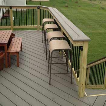 A PLACE TO EAT AND HANG OUT - Adding a bar top over your deck railing is a simple & affordable way to add extra seating + entertainment space. Reling Design, Deck Bar, Patio Railing, Deck Railing Design, Deck Seating, Deck Building, Patio Deck Designs, Wooden Deck, Deck Designs Backyard