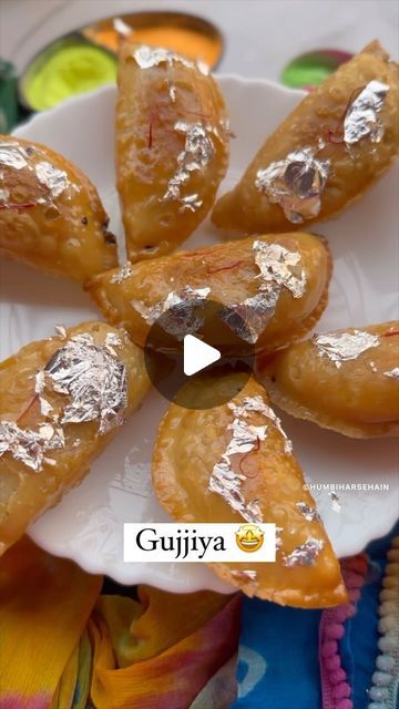 निधि राठौड़ on Instagram: "#holi2024 Gujiya recipe😌 Let’s make this deep fried sugar infused sweet with a delightful filling of Khoya, fry fruits, coconut. SAVE the reel to try later :)) ➡️ Steps :- 1) In a kadai heat ghee, add 1 cup Sooji, 1tbsp Coconut powder, 1 tbsp dry fruits, ½ cup Khoya, 1 tsp Cardamom powder, 2 tbsp Powdered Sugar. Sauté over medium flame until it turns aromatic and changes colour. Make sure everything binds well. Let the mixture cool 2) Now in a bowl add 2 cup Maida, 1 tbsp ghee. Mix to combine well. Gradually add water and knead a dough. Rest the dough for 15 min 3) Make balls of the dough and roll into thick circle 4) Place the rolled circle on a Gujiya mould, moisten the edges. Place 2 tbsp of the mixture. Cover and seal the edges tightly. Remove the extra doug Gujiya Recipe, Holi Recipes, Coconut Powder, Dry Coconut, Light Golden Brown, Deep Fry, Food Content, Cardamom Powder, Dry Fruits