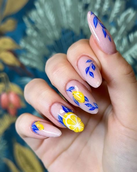 Lemon and blue! These nails combine bright yellow lemons and blue leaves for a refreshing and vibrant summer look. 🍋💙@cherrynails Blue Yellow Green Nails, Summer Nail Ideas 2024, Fun Nails Designs, Blue Yellow Nails, Interesting Nail Designs, Blue And Yellow Nails, Nail Design Blue, Fun Nail Ideas, Vibrant Nail Colors