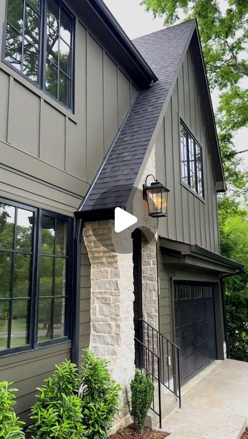 AMBER | New Build Designer on Instagram: "If you are looking for a dark and moody exterior paint color…look no further! 👀This was my first time using this color and definitely won’t be my last! 🖤  “Limestone” SW 9599 by @sherwinwilliams   #paintcolor #homebuilding #homedesign #homeexterior #homedecor #interiordesign #exteriordesign #sherwinwilliams #newconstruction" Moss Green Exterior House Paint, Wooden Exterior House Color Schemes, Deep Creek Benjamin Moore Exterior, Bronze Windows Exterior Paint Colors, Ashwood Moss Benjamin Moore Exterior, Collingwood Benjamin Moore Exterior, Sw Eclipse Paint Exterior, Exterior Dark Paint Colors For House, Thunderous Sherwin Williams Exterior