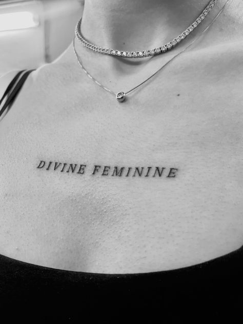 Chest Feminine Tattoo, Text Tattoo On Chest Woman, Divine Feminine Tattoo Collarbone, Simple Chest Tattoos For Women, Small Girly Neck Tattoos, Feminine Sign Tattoo, Divine Feminine Word Tattoo, Divine Chaos Tattoo, Divine Feminine Neck Tattoo