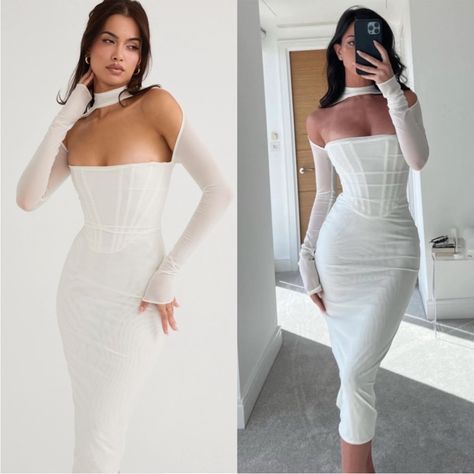 This Sold Out Midi Dress Defines Class And Elegance. It’s Cut From The Softest Stretch Powermesh In Delicate White For An Ultra Cinched Fit That Skims Every Curve In A Figure Flattering Silhouette. It Features An Incredible Corsetry Boning To Cinch The Waist And The Elegant High Neck And Sexy Low Baring Neckline Highlight The Dcolletage Beautifully And Creates An Open Front With Wrap Around Sleeves. The Back Turns To Reveal A Generous Keyhole Cutout With A Button And Zip Fastening For Easy On An Wedding Dresses For Courthouse Wedding, Elopement Dress Courthouse, Long Sleeve Courthouse Wedding Dress, Courthouse Dresses, Corset White Dress, Vegas Elopement Dress, Curvy Wedding Dress, Mermaid Midi Dress, Corset Style Dresses