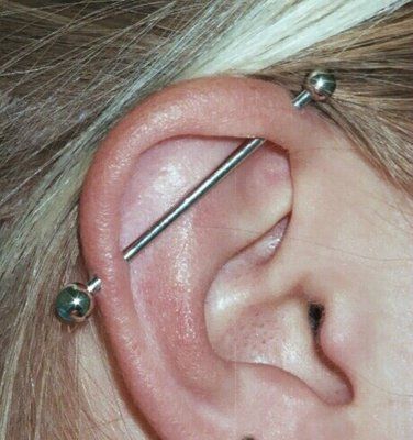 Industrial Piercings. Middle Lip Piercing, Earrings Piercings, Ear Piercings Industrial, Eyebrow Slits, Industrial Piercing Jewelry, Cool Piercings, Industrial Piercing, Cute Piercings, Ear Piercing