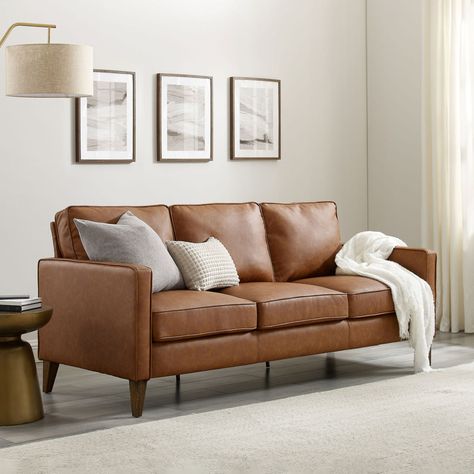 This Hillsdale Jianna Faux Leather Sofa originally $649 dropped to just $349 at Walmart. You save 46% off the retail price for this faux leather sofa. Plus, this item ships free. We could not find this sofa for less online. The Hillsdale Jianna Sofa features a modern farmhouse design, faux leather upholstery, seating for 3, […] Leather Couch Repair, Leather Couches Living Room, Brown Leather Couch, Scandinavian Sofas, Cool Couches, Faux Leather Sofa, Brown Leather Sofa, Corner Sofa Set, Leather Couch