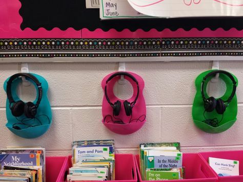 Use command hooks and baby bibs for tidy headphone storage! Class Headphone Storage, Headphone Classroom Organization, Headphone Class Storage, Classroom Headphones Storage Ideas, How To Store Headphones In A Classroom, Classroom Headphone Storage, Headphone Storage Classroom, Classroom Headphone Storage Kindergarten, Organizing Headphones In The Classroom