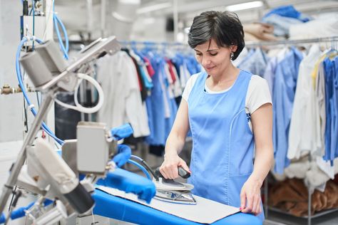 The term dry cleaning is a bit of a misnomer. Learn what is involved in dry cleaning clothes and tips to get the best results from a dry cleaner. Dry Cleaning Clothes, Dry Cleaning Business, Laundry Dry Cleaning, Iron Clothes, Clothes Washing, Commercial Laundry, Pickup And Delivery Service, Dry Cleaning Services, Laundry Drying