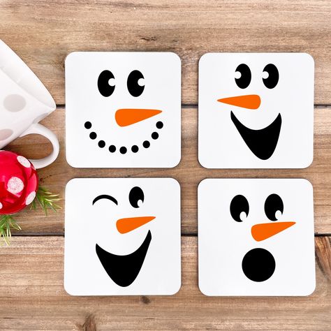 "Just look at these adorable snowman faces, they have such personality! You can purchase just one or all four! It is so fun to mix and match depending on your favorite little snowman face!! We want to make it easy to give a fun gift to everyone you know - friends, family, co-workers, and the list goes on. *Gloss White Hardboard Square Coaster *Cork Back to protect furniture *Size 3.75\" x 3.75\" x .125\" *Made in the USA *In door use only *Clean with a damp cloth *Not dishwasher safe" Christmas Coaster Ideas, Christmas Coasters Diy, Diy Christmas Coasters, Christmas Bazar, Snowman Coasters, Fun Holiday Drinks, Coasters Funny, Coasters Cute, Coasters Christmas