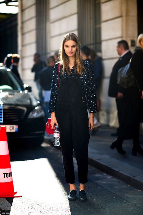 7 Ways to Wear Black Overalls via @WhoWhatWearAU Overalls Street Style, Street Style Stockholm, Tilda Lindstam, Wearing Overalls, Overalls Outfits, Glamour Party, Walking Down The Street, Stockholm Street Style, Black Overalls