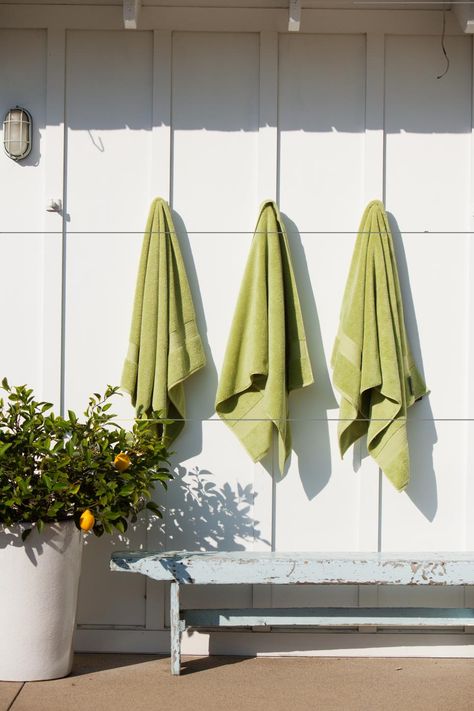 Towel Hanger For Pool Area, Outdoor Pool Towel Hooks, Farmhouse Pool Ideas, Outdoor Towel Hooks, Cottage Style Exterior, Pool Towel Hooks, Towel Hanging Ideas, Beach Towel Storage, Hanging Bath Towels