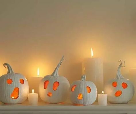 white ghost pumpkins as jack o lanterns for Halloween are a simple and cool solution that you can easily DIY White Ghost Pumpkin, Carved White Pumpkin, Halloween Fireplace, Ghost Crafts, Halloween Craft Projects, Halloween Ghost Decorations, Hallowen Ideas, Halloween Fest, Casa Halloween