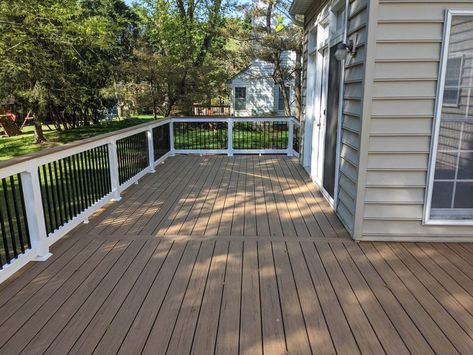 Antique Leather Timbertech, Brown Deck With Black Railings, Timbertech Antique Leather Deck, Wood Deck With Vinyl Railing, Deck Colors For Brown House, Timbertech Weathered Teak, Deck On Brick House, Trex Deck Ideas Color Schemes Brown, Timbertech Deck Colors