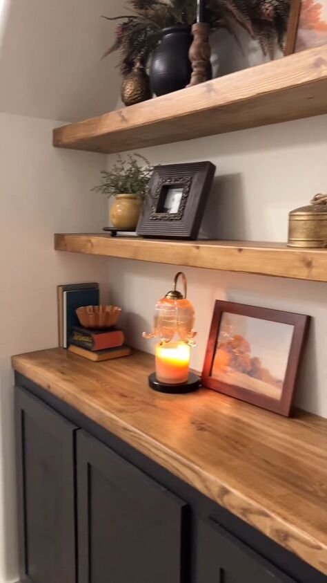 We built these easy DIY floating shelves in place even though our alcove was a very tight space. We’ll take you through the steps for how to build floating shelves. Decorating Long Floating Shelves, How To Make Kitchen Shelves, How To Make Thick Floating Shelves, Floating Shelves Stain Color, Stain Color For Floating Shelves, Diy Shelves On Side Of Fireplace, Pantry Floating Shelves Diy, How To Make Wooden Floating Shelves, Floating Shelf Stain Color