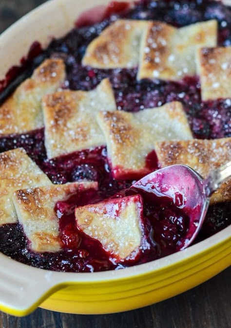 Growing up I remember helping my grandmother make cobblers, specifically berry cobblers. We would go pick wild berries for hours and come home and make a big cobbler to be served after dinner with a huge scoop of vanilla ice cream. Sometimes, we even made the ice cream from scratch with the big old ice … Berry Cobbler Recipes, Cherry Cobbler Recipe, Blackberry Cobbler Recipe, Cobbler Recipes Easy, Store Bought Pie Crust, Blackberry Recipes, Berry Cobbler, Fruit Cobbler, Dessert Aux Fruits