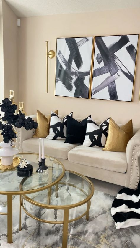 Black And Gold Studio Apartment, Black White And Gold Painted Wall, Black And White Bedroom With Gold Accent, Black And Gold Sitting Room, Neutral Black And Gold Living Room, Black Gray Gold Cream Living Room, Grey Couch Living Room Gold Accents, Gold White Black Living Room, Gold And Tan Living Room