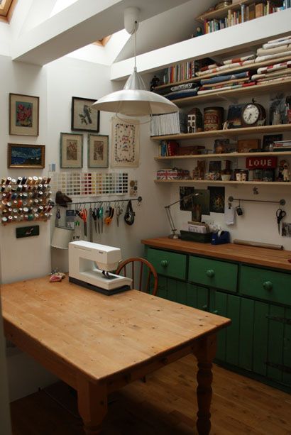 studio 1 Inspiring Desk Space, Sewing Studio Inspiration, Art And Sewing Studio, Fabric Studio Design, Tidy Craft Room, Sewing Wall Storage, Green Sewing Room, Functional Craft Room, Textile Studio Space