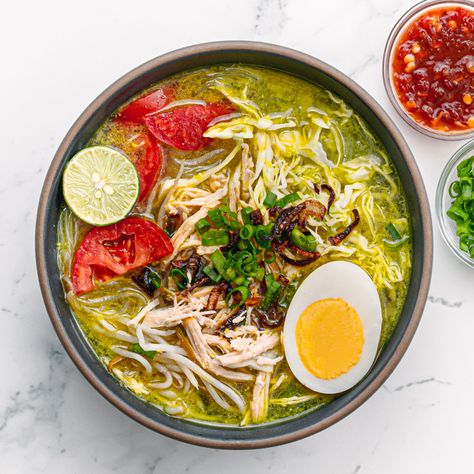 If you have been to Jakarta, Bali, or any part of Indonesia and are craving that delicious Soto Ayam, you can now make it right at home. It's the best soup to serve on cold or rainy days. Soto Ayam, also known as Soto Ayam Bening is one of the easiest Indonesian soup recipes you can make. Anyone can put this meal together, there are no special cooking skills required.#SotoAyam #recipe Indonesian Cuisine, Soto Ayam Recipe, Daging Babi Panggang, Soto Ayam, Egg Tart, Homemade Spices, Asian Flavors, Carne Asada, Indonesian Food