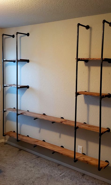 Floating Pipe Shelving Garage Man Cave Ideas On A Budget, Pipe Closet, Shelving Diy, Diy Pipe Shelves, Pipe Shelving, Built In Shelves Living Room, Simple Closet, Industrial Pipe Shelves, Closet Design Layout