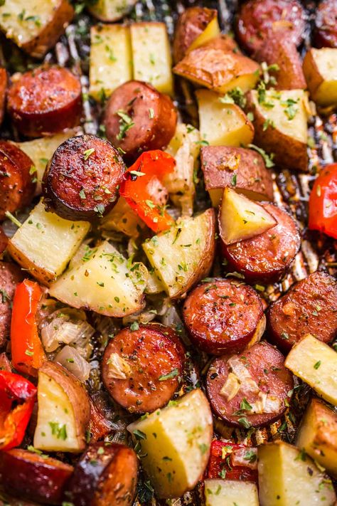 Sheet Pan Sausage and Vegetables is an easy weeknight dinner that you can prep in a few minutes with bell peppers, red potato, and zucchini. Sausage Potatoes And Peppers, Kilbasa Sausage Recipes, Potato And Zucchini, Sausage And Vegetables, Andouille Sausage Recipes, Kielbasa And Potatoes, Pan Sausage, Sheet Pan Sausage, Sausage Peppers And Onions