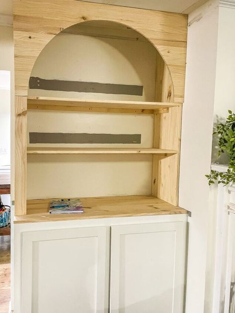 How To Build Arched Bookcases The Easy WayAdd arched bookcases Built In Curved Bookcase, Ikea Hack Arched Bookcase, Built Ins Around Arched Doorway, Arched Built Ins Living Room Diy, Diy Arched Built In Bookcase, Diy Faux Built In Bookcase, Build In Arch Shelf, How To Add An Arch To A Bookshelf, How To Build Arched Built Ins