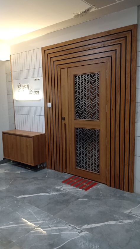 Safty Door Panelling Design, Door Design With Golden Strip, Entrance Door Panelling, Safety Door With Paneling, Main Door Elevation Designs, Mani Doors Design, Office Front Door Entrance, Sefty Door Design Modern Wooden, Main Door Panelling Design