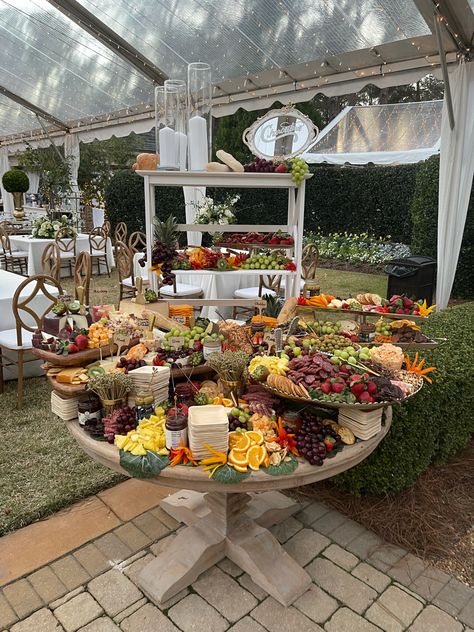 Charcuterie On Round Table, Appetizer Display Wedding, Charcuterie Cups Table Display, Round Table Food Display, Tiered Grazing Table Ideas, Layered Charcuterie Table, Charcuterie Display Presentation, Charcuterie Tiered Tray, Round Table Charcuterie Display