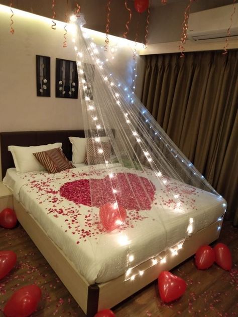 romantic bedroom decor ideas petals balloons canopy First Night Room Decoration, Bridal Room Decor, Wedding Night Room Decorations, Romantic Room Surprise, Romantic Dinner Decoration, Rooms Decoration, Romantic Room Decoration, Surprise Birthday Decorations, Birthday Room