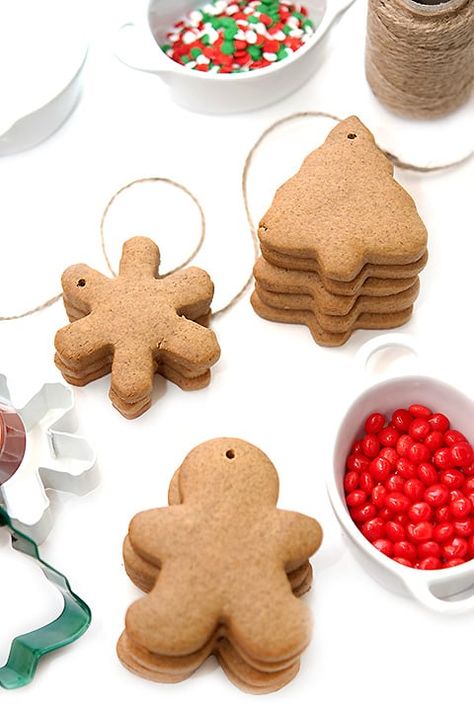 Gingerbread ornaments are a fun family project and simple to make! These are non-toxic so even your little helpers can sneak a bite (or two)... Gingerbread Ornaments Recipe, Applesauce Ornaments, Gingerbread Christmas Ornaments, Recipe For Gingerbread, Cinnamon Applesauce Ornaments, Gingerbread Man Cookie Recipe, Cinnamon Applesauce, Cinnamon Ornaments, How To Make Gingerbread