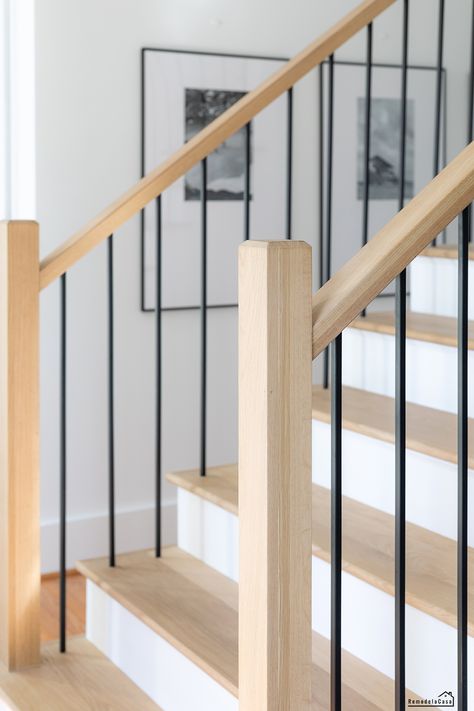 Modern staircase makeover Modern Newel Post, Modern Handrails For Stairs, Angled Staircase, Newel Posts For Stairs, Hardwood Stair Treads, Hardwood Floor Installation, Stair Railing Makeover, Stair Newel Post, Diy Stair Railing