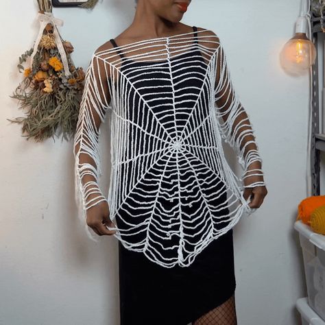 🕷️✨ Embrace your inner spider goddess with my new Spiderweb Sweater pattern! This cozy, oversized design features a playful distressed look and a stunning spiderweb motif that’s perfect for adding a touch of grunge to your autumn wardrobe. Available in sizes XS-5XL, it drapes beautifully with an off-the-shoulder fit—ideal for layering with your favorite pieces. I had so much fun creating this sweater, and I can’t wait to see how you all put your own spin on it! 🕸️Thanks for all of you who vot... Spider Goddess, Spiderweb Sweater, Creative Textiles, Autumn Wardrobe, Crochet Shrug, Sweater Crochet, Textile Fiber Art, Basic Crochet Stitches, Sweater Crochet Pattern